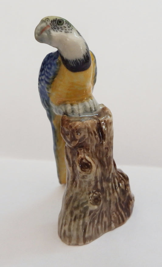Blue Macaw head turned Porcelain miniature figurine