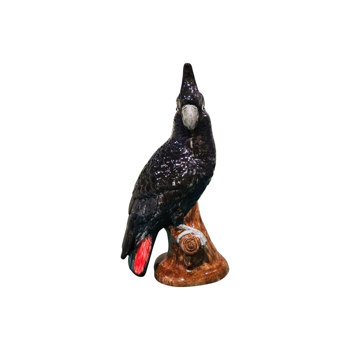 Red Tailed Black Cockatoo figurine on a white background
