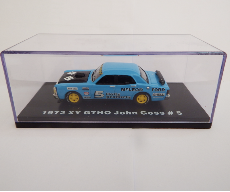 Model car of a 1972 XY GTHO Ford in a clear display case on a white background