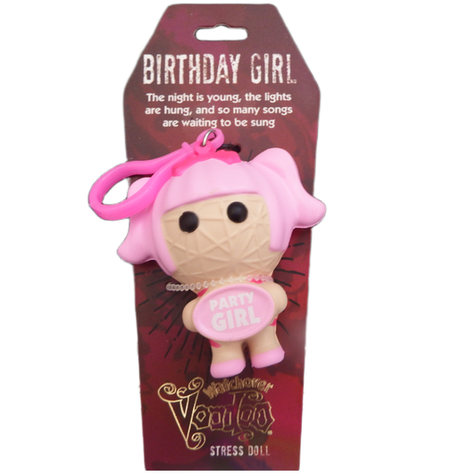 Stress doll with pink hair and 'Party Girl' shirt in packaging with text and branding.