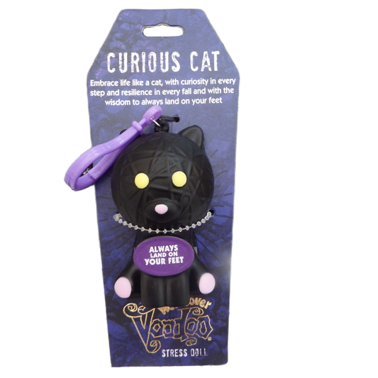 Black cat-shaped stress doll with purple accents on a blue packaging background