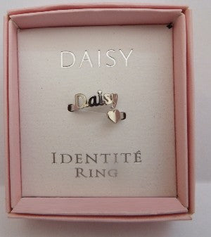 Ring with heart details in a pink box labeled 'DAISY IDENTITE RING'.