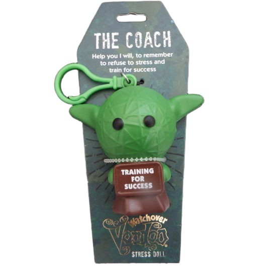 Green stress doll with a keychain and packaging on a white background