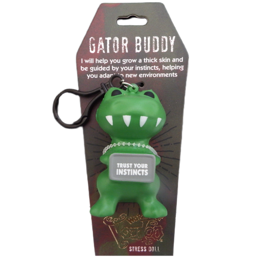Green gator-shaped stress doll with 'Gator Buddy' packaging on a white background