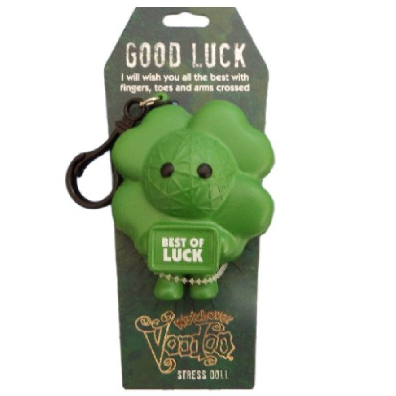 Green stress doll with 'Best of Luck' text on packaging labeled 'Good Luck'.