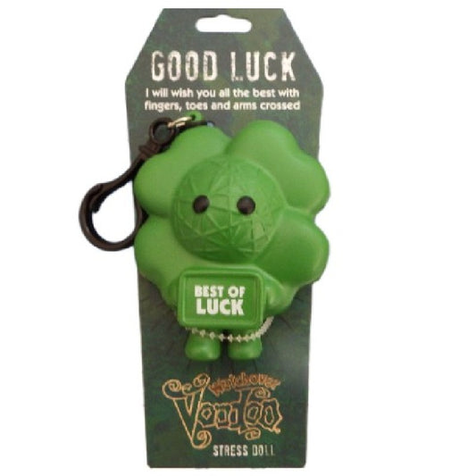 Green stress doll with 'Best of Luck' text on packaging labeled 'Good Luck'.