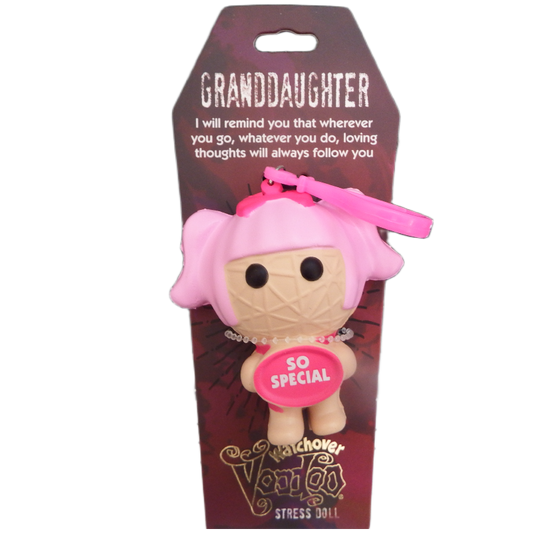 Stress doll with pink hair and a pink tag with caption saying 'so special'   on a purple packaging 
