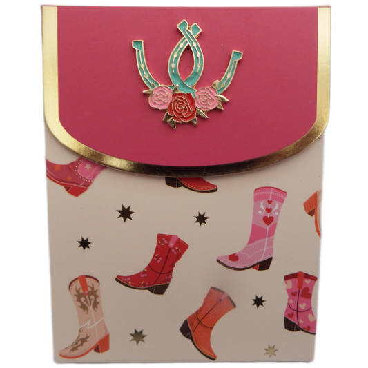 Card with pink top and pattern of horse- riding boots and horseshoes on a beige background