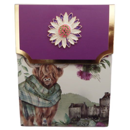 Card with a purple top featuring a floral design, a highland cow, and a scenic background.