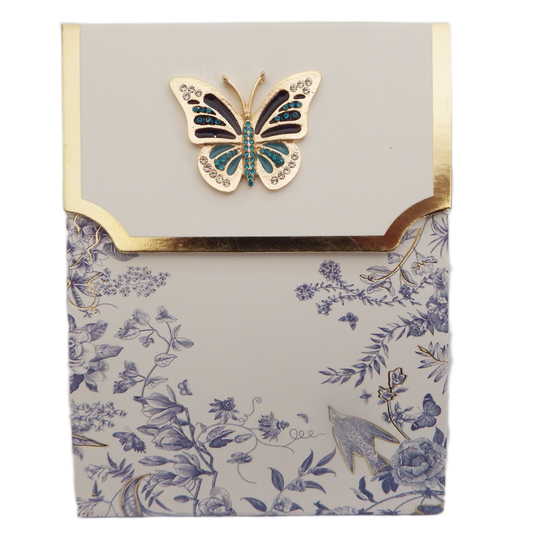 Notebook with butterfly design on cover and floral pattern on pages