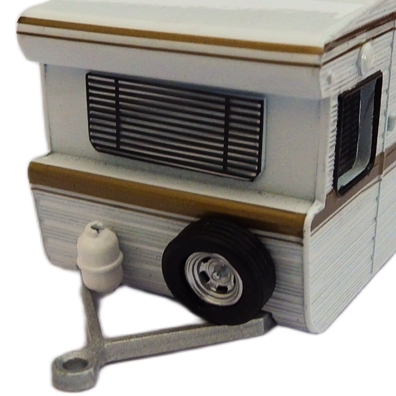 front of Model detail of a camper  caravan with a white body and white roof on a white background
