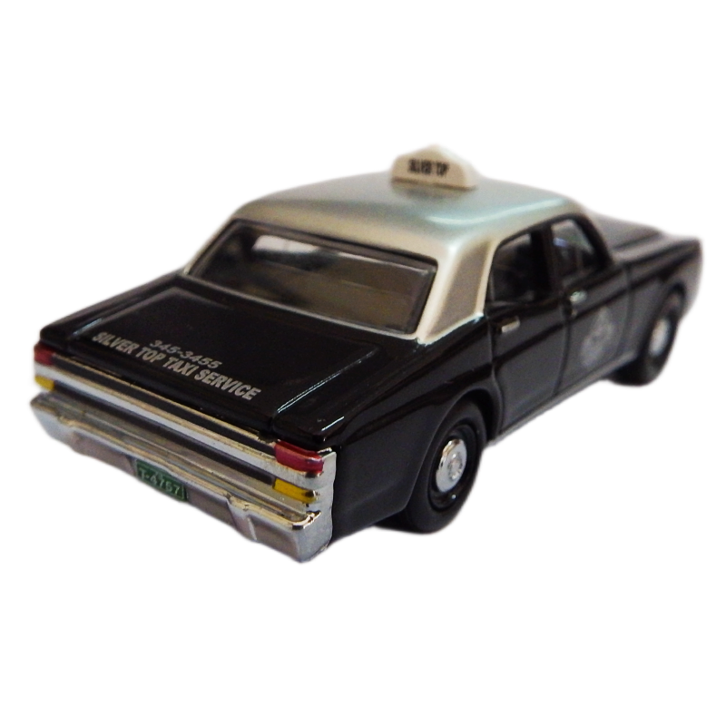 Model of silver top taxi car on a white background