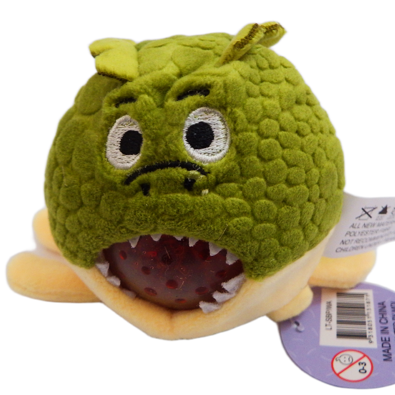 Green plush lizard squishy  toy with a textured surface and a red interior, on a white background.