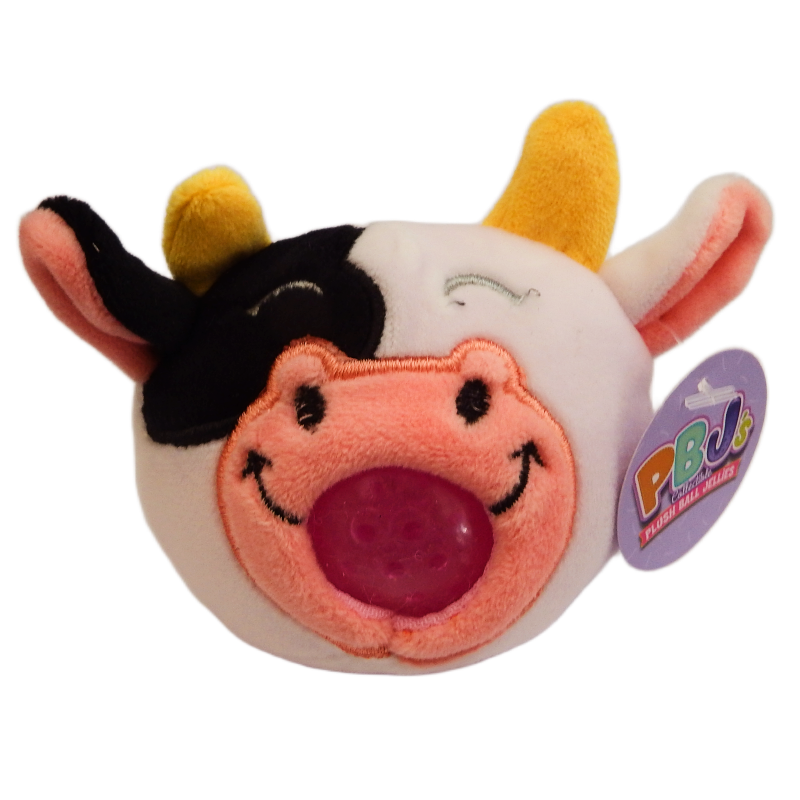 Plush toy cow with a pirate hat and tag on a white background