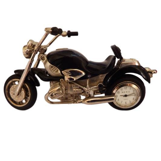 Motorcycle-shaped clock on a white background