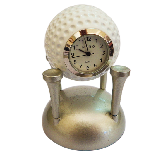 image golf ball nero clock suporded by silver tees on white background