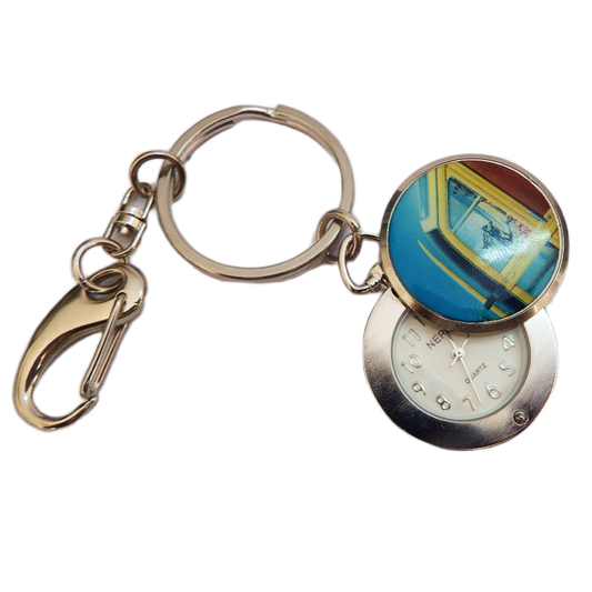 Keychain with a round keyring and a pocket watch face on a white background