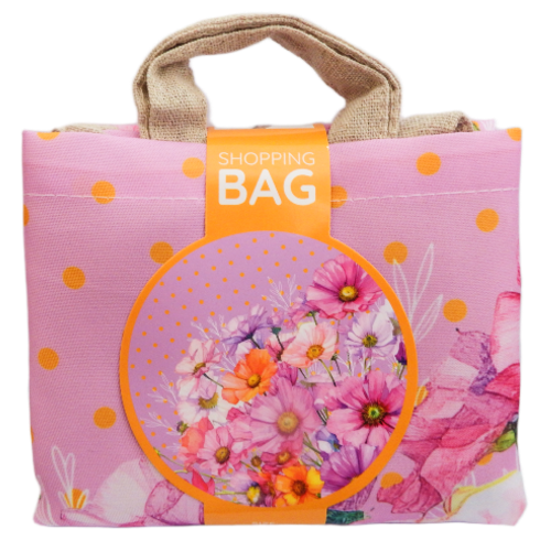 Floral-patterned shopping bag with a visible brand label on a white background