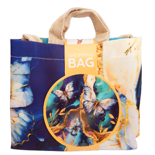 Floral and butterfly design shopping bag with a visible brand label.