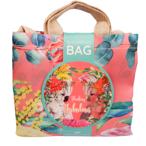 Floral shopping bag with a label featuring cockatoos and text on a white background