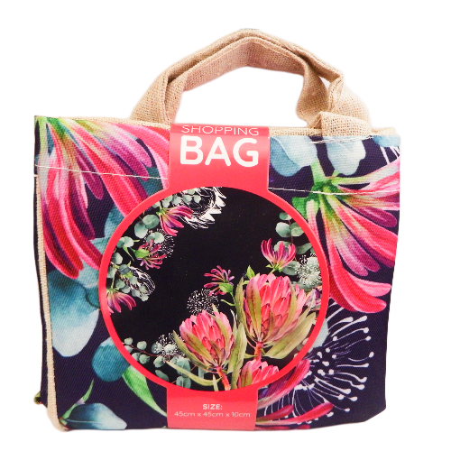 Floral shopping bag with a visible brand label on a white background