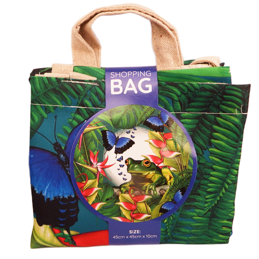 Tropical-themed shopping bag with a colorful design featuring butterflies green tree frog and plants, on a white background.