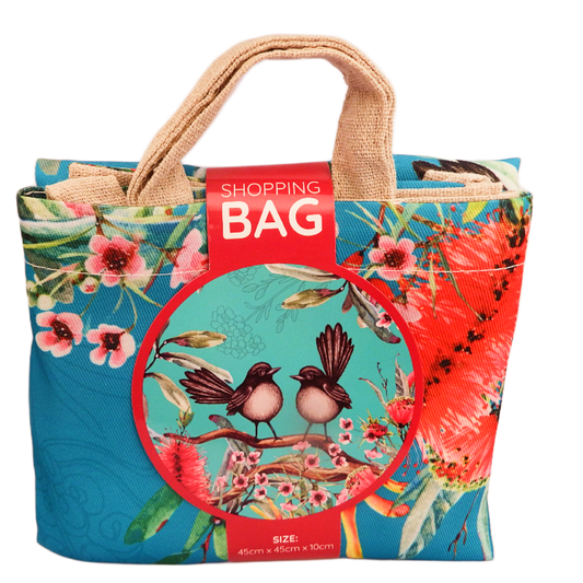 Colorful shopping bag with willy wagtail bird and floral design on a white background