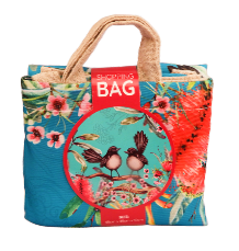 Tote bag with floral design and bird illustration on a colorful background