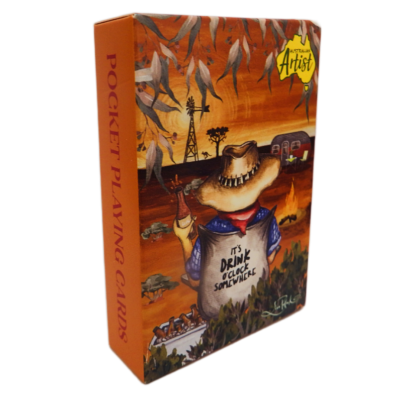 Card box with artistic design featuring a character and text, on an orange Outback Landscape background.