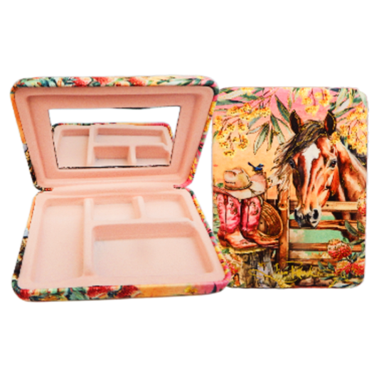 Makeup case with floral and horse design on a white background