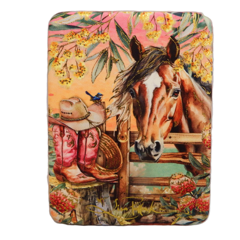 Decorative jewellery case with a horse and cowboy boots design on a colorful background