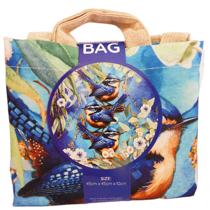 Colorful tote bag with blue wren bird design and size label on a white background