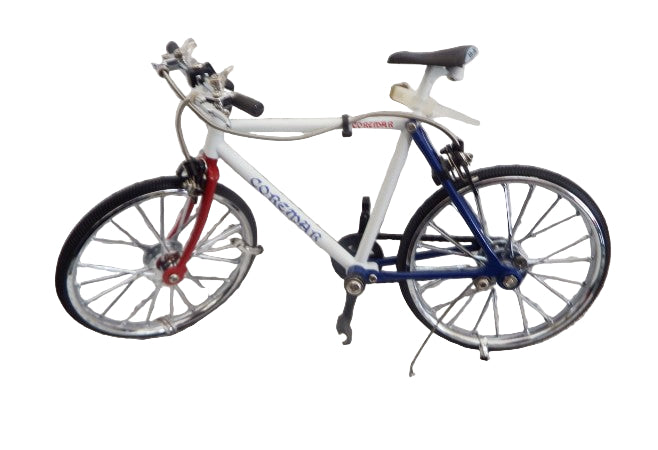 Model bicycle on a textured surface
