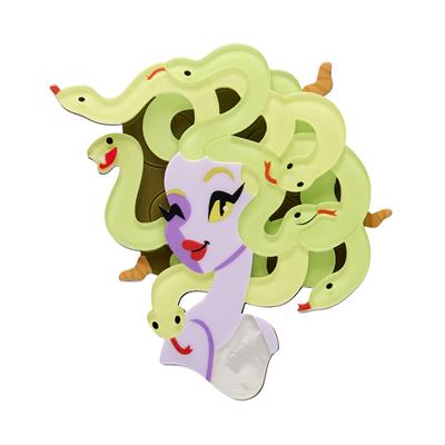 Colorful erstwilder brooch depicting central character with a  green snake-hair do with a central character on a white background