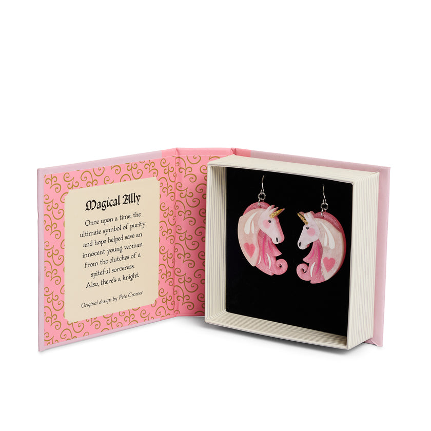 Unicorn-shaped earrings in a decorative box with pink and gold design