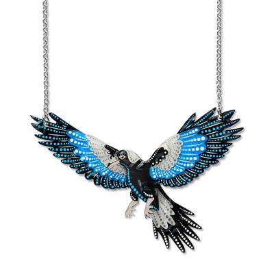 Jewelry necklace with a detailed bird pendant on a white background