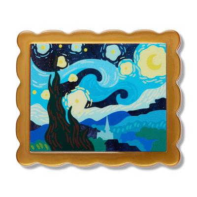 Framed artwork resembling 'The Starry Night' with a gold border.