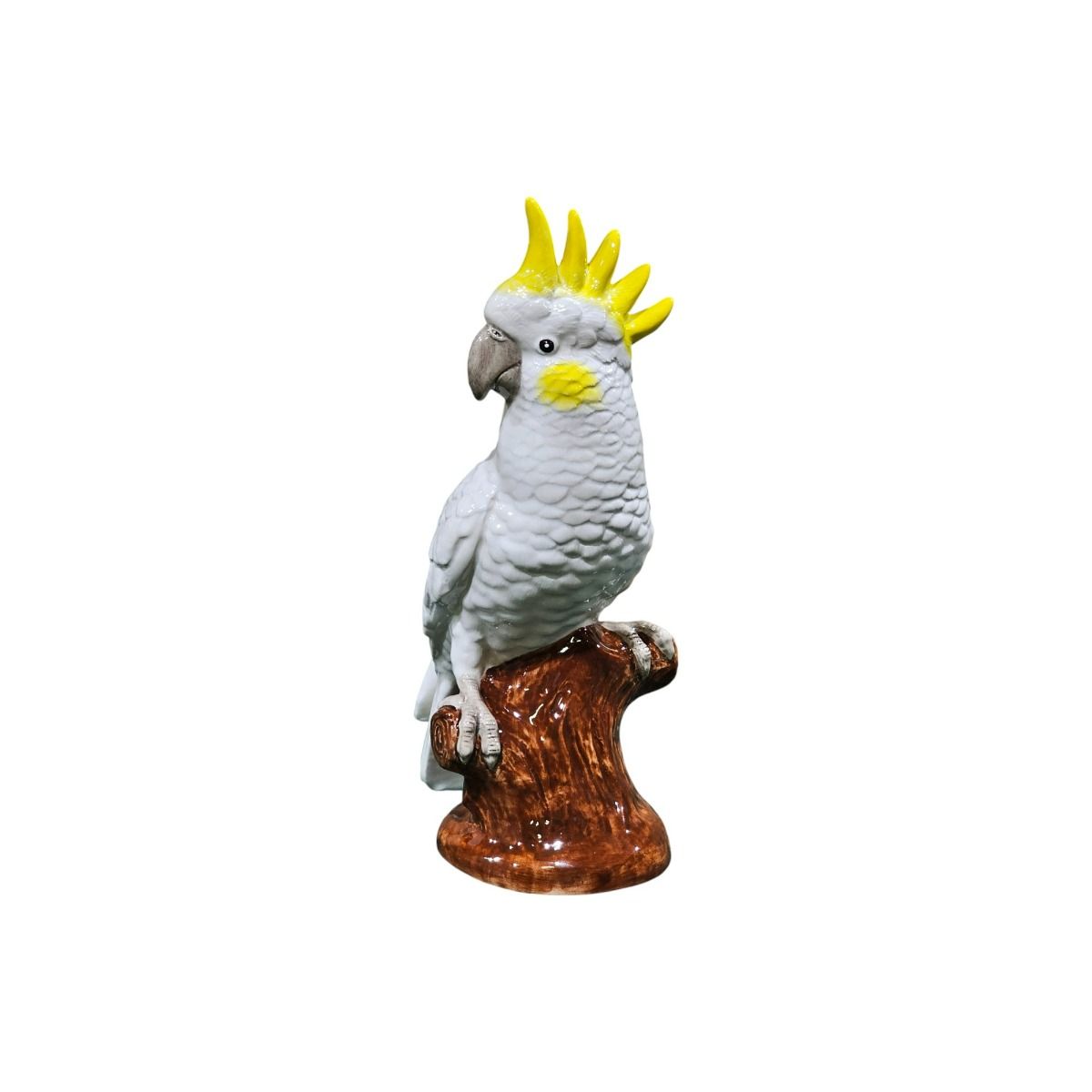 Yellow Crested White Cockatoo figurine with yellow crest on a white background