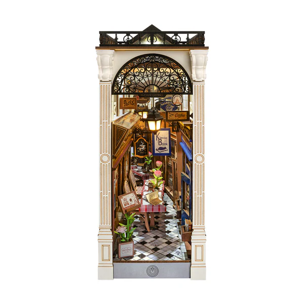 Decorative model of a shopping arcade scene with architectural elements on a white background