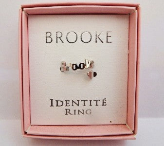 Ring in a pink box with 'Brooke Identité' branding on a white background