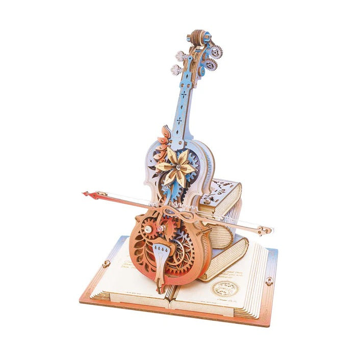 Decorative colourded self playing model of a cello with gears on a white background