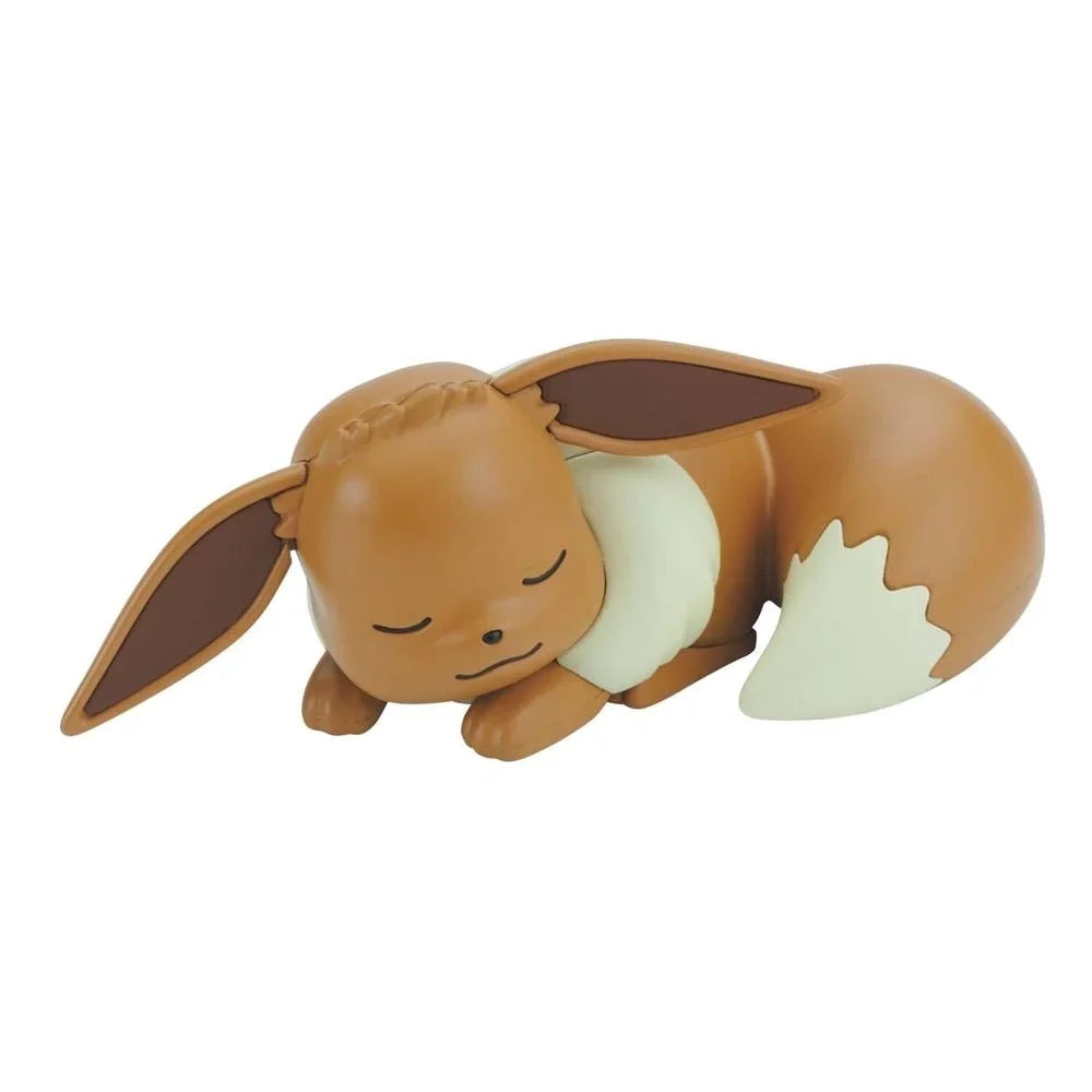 Sleeping Eevee figurine on a white background