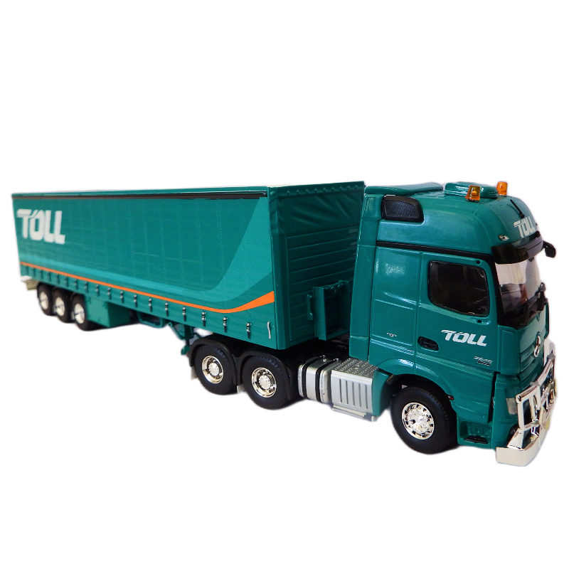Model truck with 'TOLL' branding on a white background