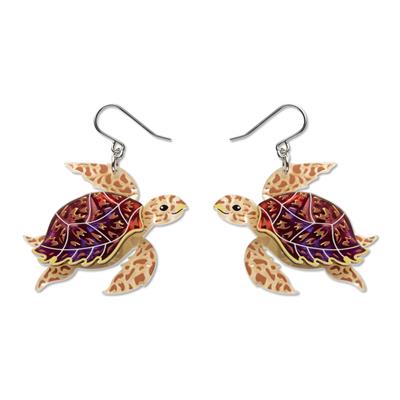 Turtle-shaped earrings with a colorful design on a white background