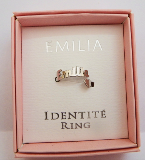 Stainless steel Emilia ring in a pink box with 'Identite Ring' branding