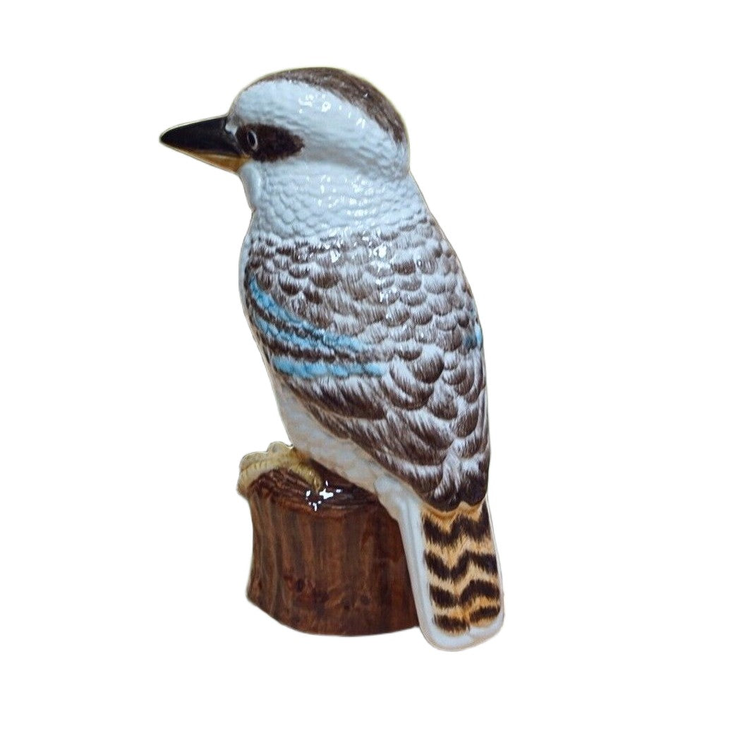 Bird figurine on a white background