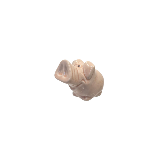 porcelain pink pig wih big nose