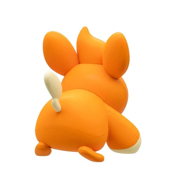 Orange pawmi toy with a white interior on a white background