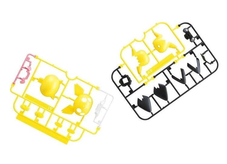 Two unpainted plastic model kit sprues on a white background. One sprue is yellow with a pink handle and features a yellow bird-like figure and small white parts.
