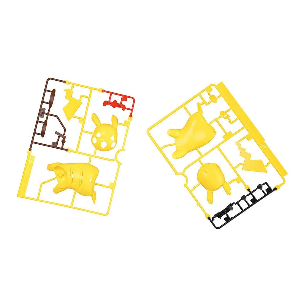 Two plastic model sprues containing yellow character parts, including a large yellow figure and smaller yellow, brown, and red details, shown on a plain white background.